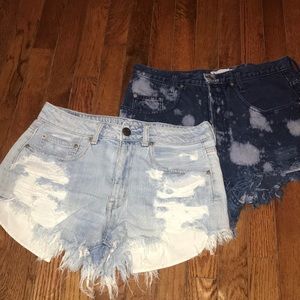 Two pair of shorts- American Eagle and Guess.